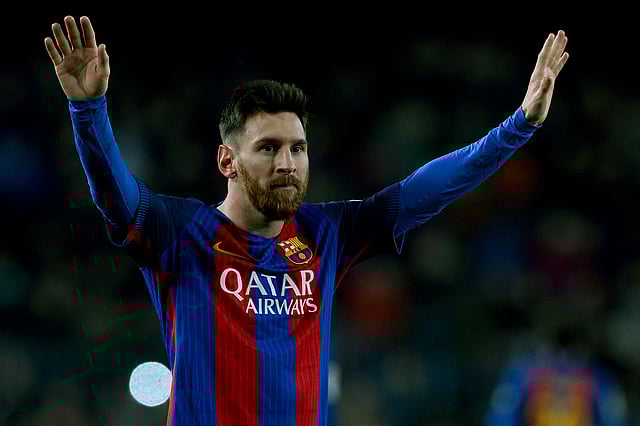 Barcelona's Argentinian forward Lionel Messi celebrates his goal during the Spanish league football match FC Barcelona vs RCD Espanyol at the Camp Nou stadium in Barcelona on December 18, 2016. AFP