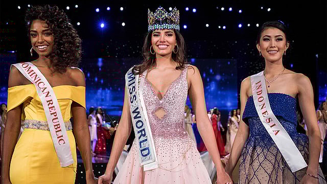 First runner up Miss Dominican Republic Yaritza Miguelina Reyes Ramirez (L); Miss World 2016 Stephanie Del Valle of Puerto Rico (C); and second runner up Miss Indonesia Natasha Mannuela (R) stand together after Del Valle`s win in the Miss World 2016 pageant at the MGM National Harbor December 18, 2016 in Oxon Hill, Maryland. Photo: AFP