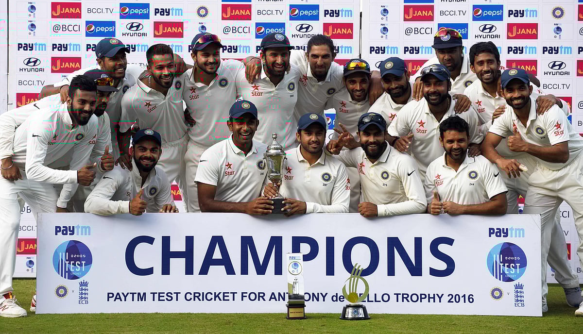 Indian cricketers celebrate winning the fifth and final Test cricket match between India and England at the M.A. Chidambaram Stadium in Chennai on December 20, 2016. AFP