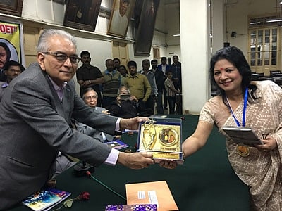 Professor Dr Nashid Kamal recieves the Michael Madhushudan Dutta literary award.