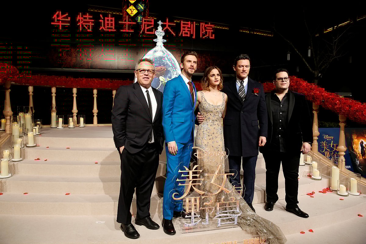 Director Bill Condon and actors Dan Stevens, Emma Watson, Luke Evans, and Josh Gad (L-R) pose for photographers on the red carpet for the film “Beauty and the Beast” in Shanghai. Reuters file photo