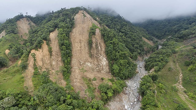 This aerial view shows one of the landslides in the mountains that caused the mudslides as a result of heavy rains, in Mocoa, Putumayo department, Colombia. Photo: AFP