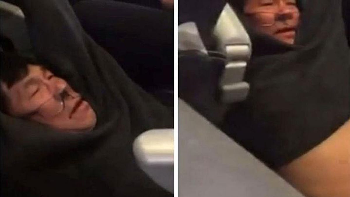A video screengrab shows passenger David Dao being dragged off a United Airlines flight at Chicago O’Hare International Airport in this video. Photo: Reuters
