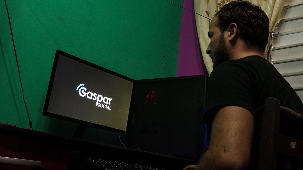 One of the creators of the Gaspar social network works on his computer in Gaspar, a small town in Ciego de Avila province in central Cuba. Photo: AFP