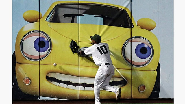San Francisco Giants left fielder Eduardo Nunez (10) reaches for a double hit by Atlanta Braves third baseman Rio Ruiz (not pictured) in the eighth inning of their MLB baseball game at AT&T Park. Photo: Reuters