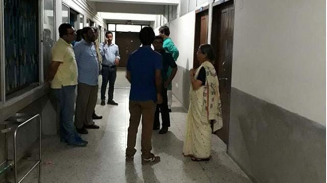 Farhad`s wife and some of his friends seen waiting in front of the hospital cabin. Photo: Prothom Alo