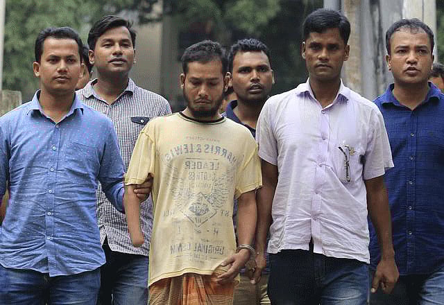 Sohel Mahfuz arrested along with three other suspected members of militant group `Neo-JMB` from Chapainawabganj in front of DB Police Office. Photo: Hasan Raja