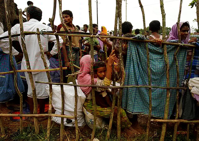 New Rohingya refugees wait to enter the Kutupalang makeshift refugee camp, in Cox’s Bazar, Bangladesh, August 30, 2017. Reuters