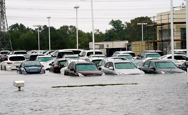 A car dealership is covered by Hurricane Harvey floodwaters near Houston. Photo: AFP