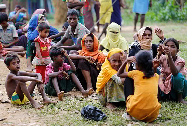 New Rohingya refugees wait to enter the Kutupalang makeshift refugee camp, in Cox’s Bazar, Bangladesh, 30 August, 2017. Photo: Reuters