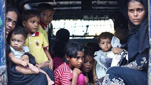 Group of Rohingya women and children travelling to the Ukhia camp from Teknaf upazila. Photo: Abdus Salam