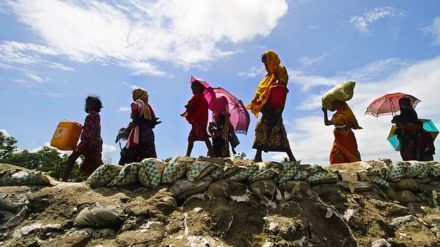 Rohingyas flee from Myanmar and enter Bangladesh through Shahpari island. Picture taken Thursday. Photo: Abdus Salam