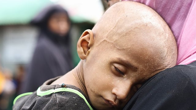 Mother waits with ailing child at the Kutupalong camp health centre in Ukhia. Picture taken on Wednesday, Photo: Abdus Salam