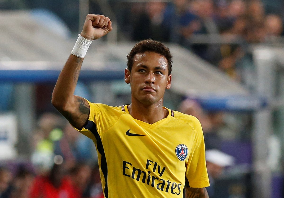 Paris Saint-Germain’s Neymar celebrates scoring their third goal. REUTERS