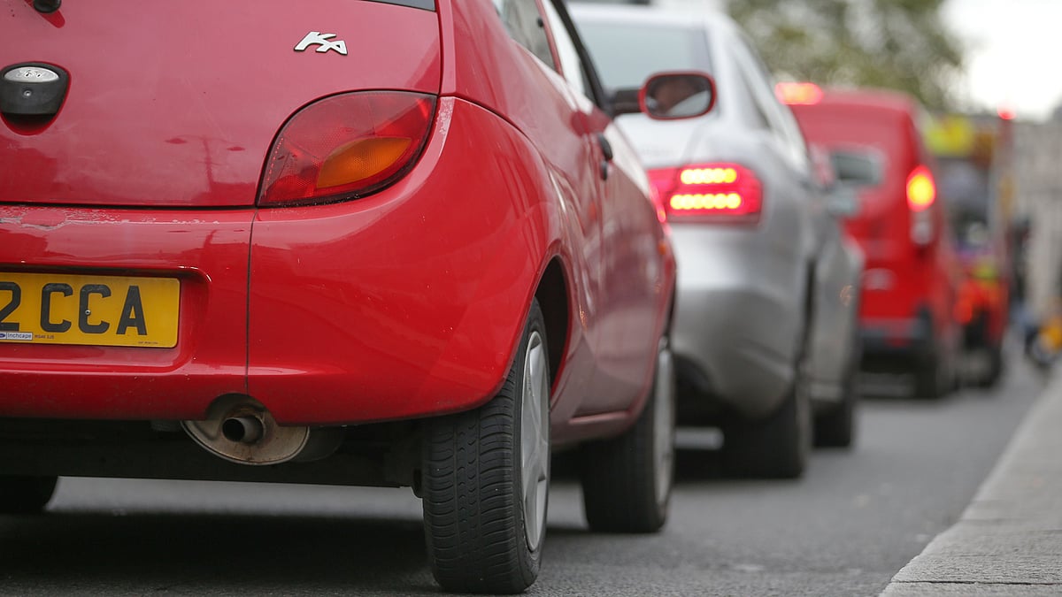 Vehicles wait in a traffic in central London, England on October 23, 2017. AFP