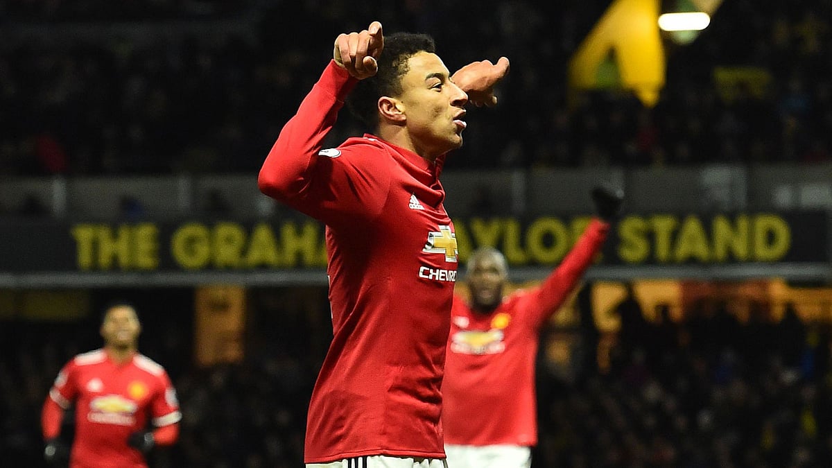 Manchester United’s English midfielder Jesse Lingard celebrates after scoring their fourth goal during the English Premier League football match between Watford and Manchester United at Vicarage Road Stadium in Watford, north of London on Tuesday. Photo: AFP