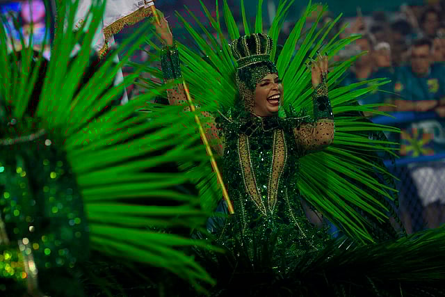 A reveller of the Imperatriz Leopoldinense samba school performs during the second night of Rio`s Carnival at the Sambadrome in Rio de Janeiro, Brazil, on 13 February 2018.  Photo: AFP
