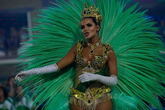 A reveller of the Imperatriz Leopoldinense samba school performs during the second night of Rio`s Carnival at the Sambadrome in Rio de Janeiro, Brazil, on 13 February 2018. Photo: AFP