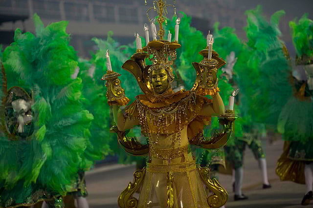 A reveller of the Imperatriz Leopoldinense samba school performs during the second night of Rio`s Carnival at the Sambadrome in Rio de Janeiro, Brazil, on 13 February 2018. Photo: AFP