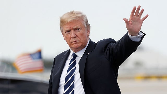US president Donald Trump waves upon his arrival in West Palm Beach, Florida, US, on 2 March 2018. Reuters