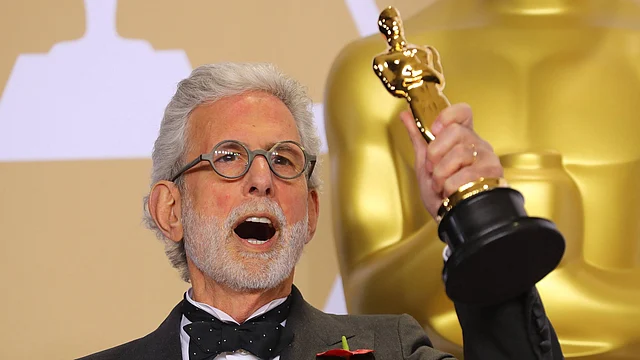 Frank Stiefel holds the Oscar for Best Documentary Short `Heaven is a Traffic Jam on the 405`. Photo: Reuters