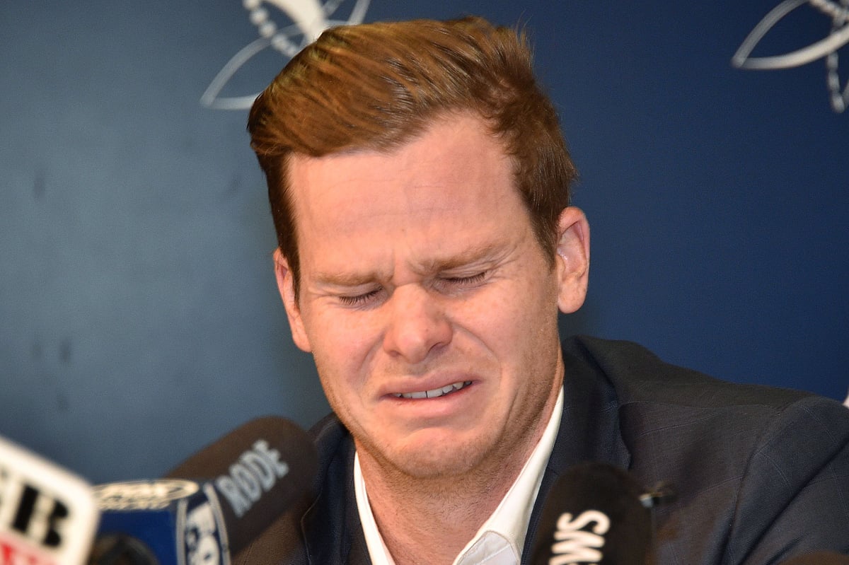 Cricketer Steve Smith reacts at a press conference at the airport in Sydney on March 29, 2018, after returning from South Africa. Distraught Australian cricketer Steve Smith on March 29 accepted full responsibility for a ball-tampering scandal that has shaken the sport, saying he was devastated by his `big mistake`. AFP