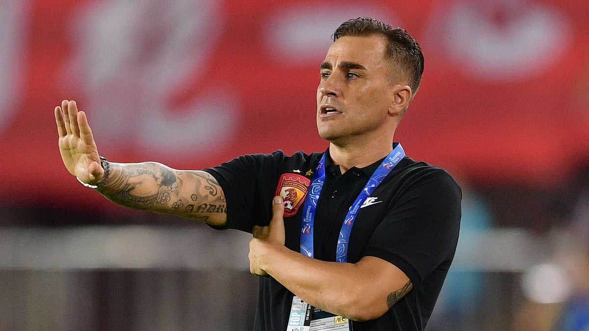 Tianjin Quanjian`s head coach Fabio Cannavaro gestures during the AFC Champions League round of 16 football match against China`s Guangzhou Evergrande on May 15. AFP