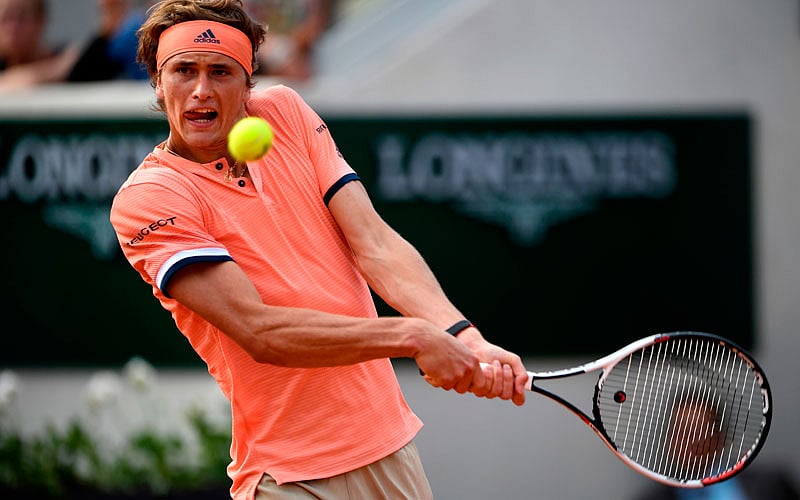 Germany`s Alexander Zverev plays a return to Lithuania`s Ricardas Berankis during their men`s singles first round match on day one of The Roland Garros 2018 French Open tennis tournament in Paris on Sunday. AFP