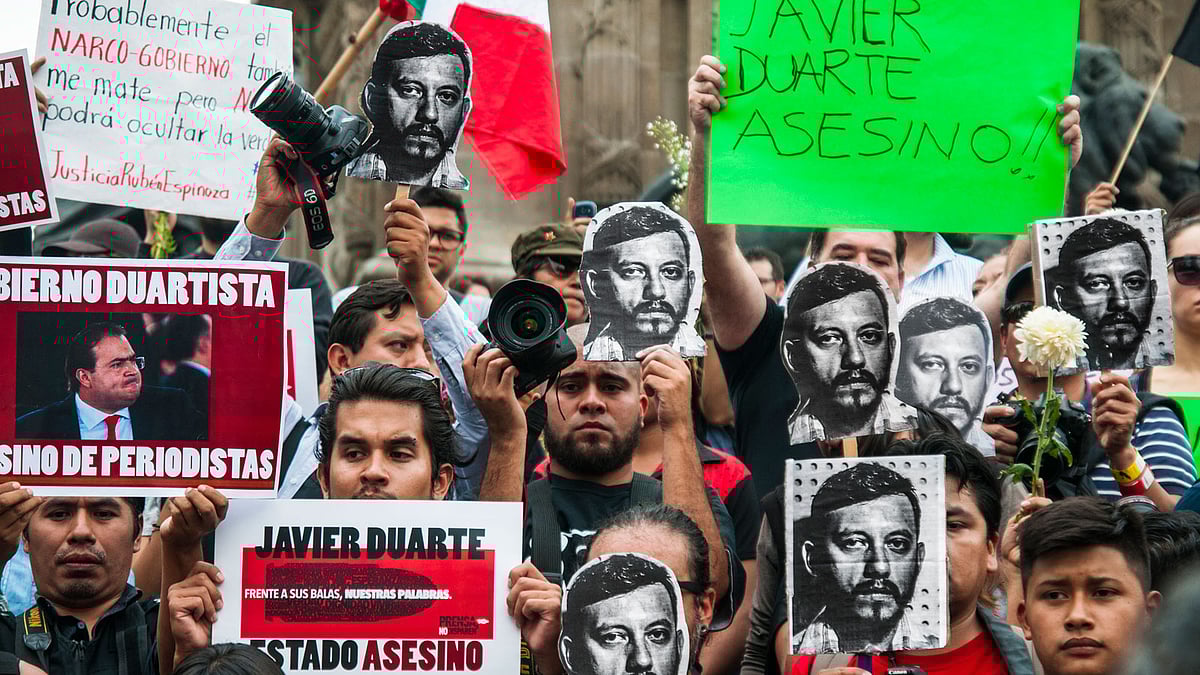 In this file photo Mexicans are seen in a protest after Rubén Manuel Espinosa Becerril, a Mexican journalist was killed in Narvate, Mexico City in 2015. Photo: Collected