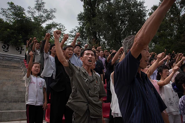 In a file photo taken on 24 July 2017 North Korean visitors leave a `revenge pledging place` after visiting the Sinchon Museum of American War Atrocities in Sinchon, south of Pyongyang. Photo: AFP