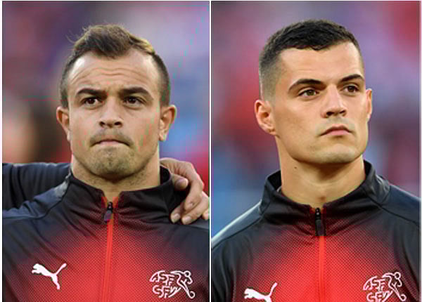 Switzerland’s Xherdan Shaqiri and Granit Xhaka. Photo: AFP