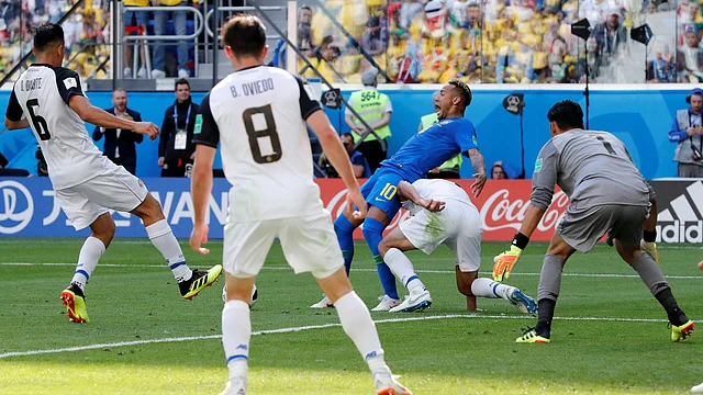 Brazil`s Neymar falls in the penalty area against Costa Rica. Photo: Reuters