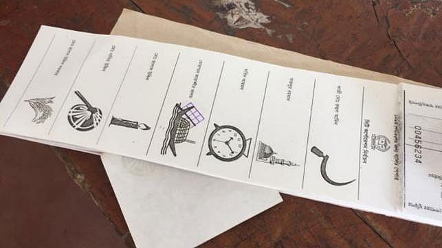 A gang of youths forcibly enters booth at the polling station of Madinatul Ulum Senior Madrasa in 26 no. ward in Gazipur, snatches ballot papers and votes for boat on 26 June. Photo: Prothom Alo