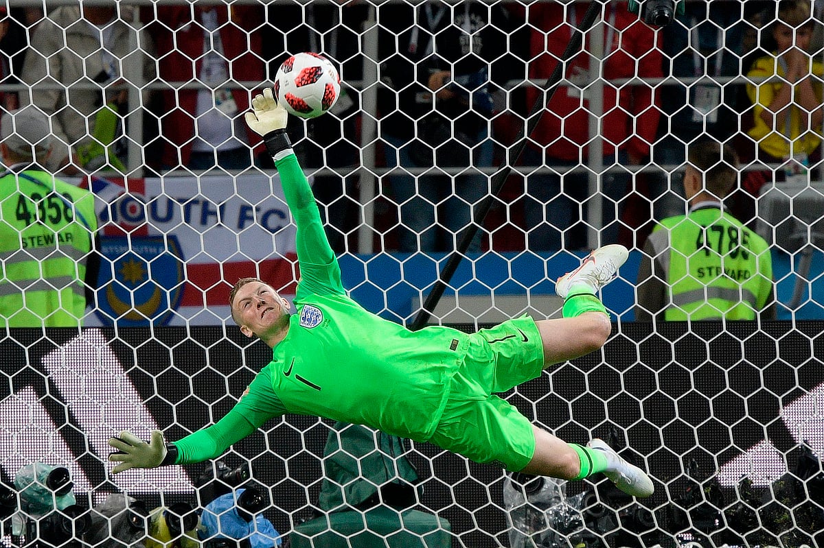 England`s goalkeeper Jordan Pickford stops Colombia`s forward Carlos Bacca`s shot during the penalty shootout at the end of the Russia 2018 World Cup round of 16 football match between Colombia and England at the Spartak Stadium in Moscow on 3 July 2018. Photo: AFP