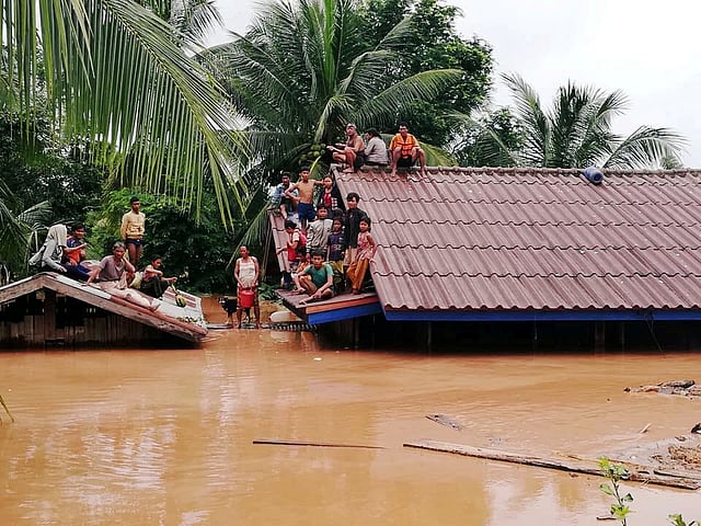 Villagers evacuate after the Xepian-Xe Nam Noy hydropower dam collapsed in Attapeu province. Reuters