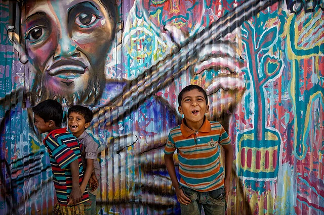 In this 21 January photo, Rohingya refugee children play outside their makeshift school in the Kutupalong refugee camp near Cox`s bazar, Bangladesh. Photo: AP
