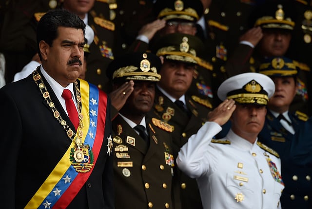Venezuelan president Nicolas Maduro (L) attends a ceremony to celebrate the 81st anniversary of the National Guard in Caracas on 4 August day in which Venezuela’s controversial Constituent Assembly marks its first anniversary. Photo: AFP