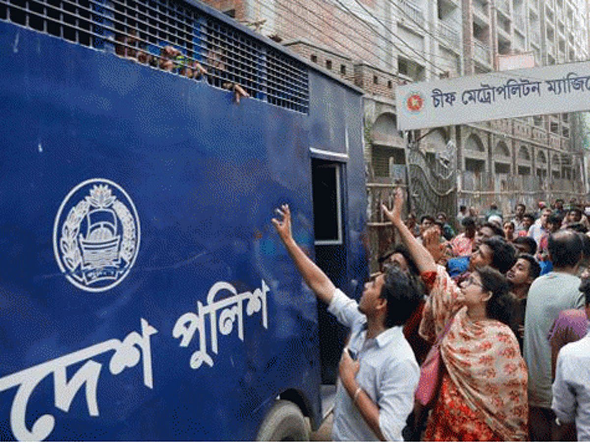 The 22 private university students being taken to jail by a prison van in front of CMM court on 9 August. Photo: Dipu Malakar
