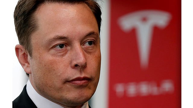 Tesla Motors Inc Chief Executive Elon Musk pauses during a news conference in Tokyo on 8 September 2014. Photo: Reuters