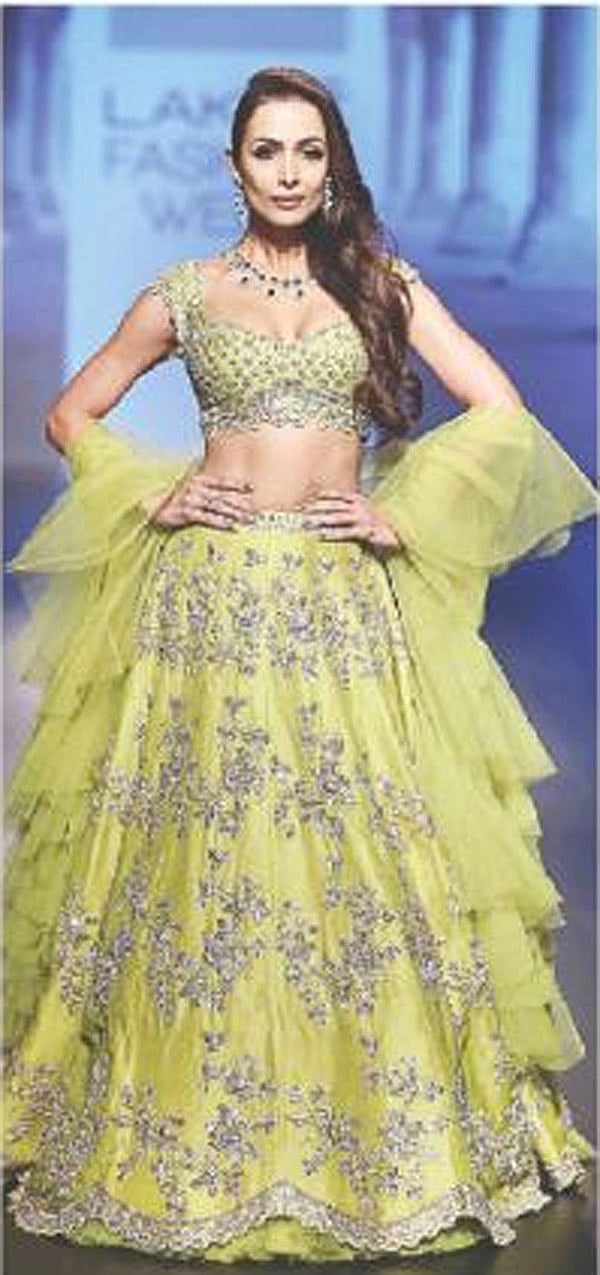 Malaika Arora spotted in fluorescent lime lehenga-choli by Anusri Reddy. Photo: Twitter