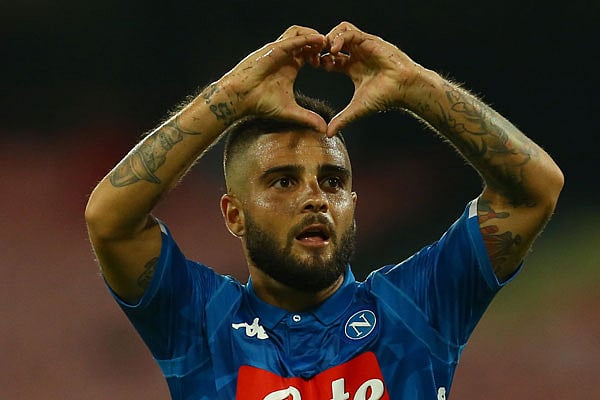 Napoli`s Italian forward Lorenzo Insigne celebrates opening the scoring during the Italian Serie A football match Naples vs Fiorentina on September 15, 2018 at the San Paolo stadium in Naples. AFP