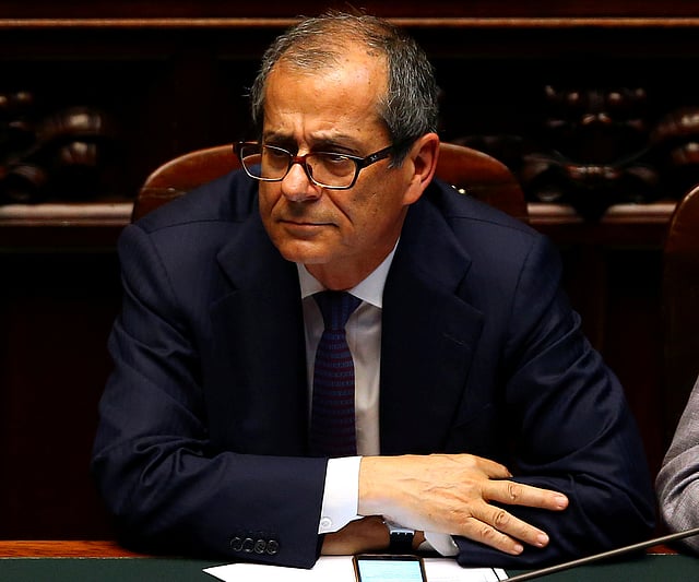 Italian economy minister Giovanni Tria attends as prime minister Giuseppe Conte (unseen) speaks during his first session at the Lower House of the Parliament in Rome, Italy, on 6 June 2018. Reuters File Photo