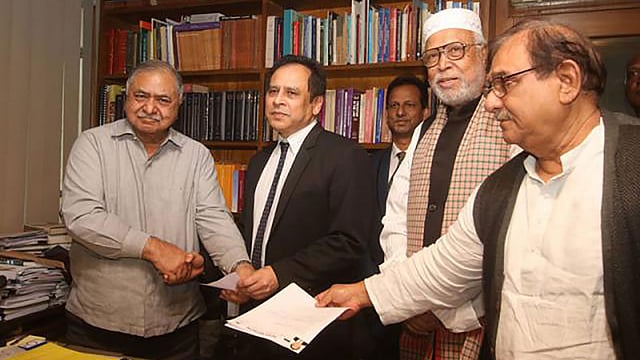 Economist Reza Kibria, son of former finance minister and Awami League leader Shah AMS Kibria, submits  the nomination form of Gono Forum to the party chief Kamal Hossain to contest the next general election on Sunday. Photo: Abdus Salam.