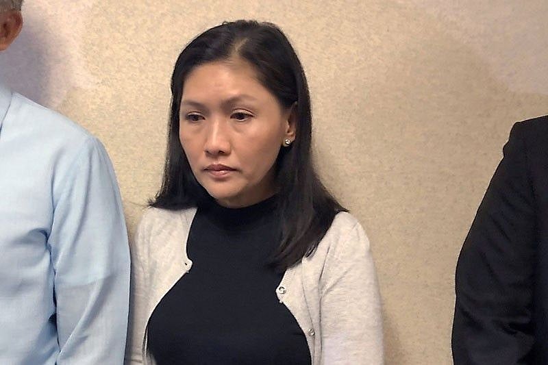 In this file photo, Maia Deguito listens as her lawyer issues a statement after she was convicted of money laundering and sentenced to up to 56 years in prison. -- Photo: PhilStar
