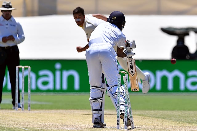 Sri Lanka`s batsman Vishwa Fernando is clean bowled by Australia`s paceman Mitchell Starc (C) during day three of the second Test cricket match between Australia and Sri Lanka at the Manuka Oval Cricket Ground in Canberra on 3 February 2019. Photo: AFP