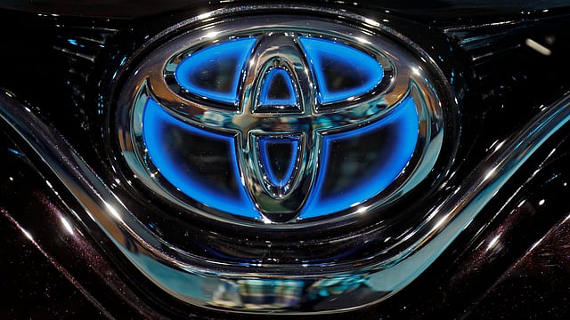 The Toyota logo is seen on the bonnet of a newly launched Camry Hybrid electric vehicle at a hotel in New Delhi. Photo: Reuters