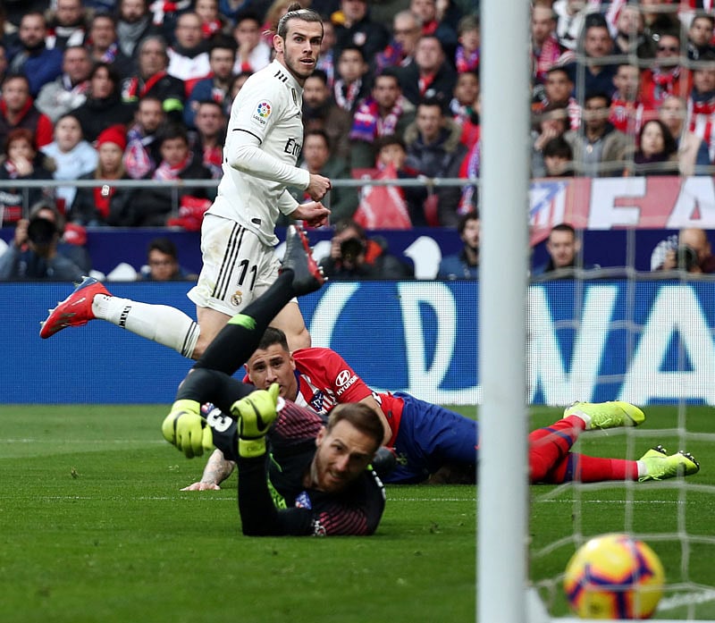 Real Madrid’s Gareth Bale scores their third goal during Atletico Madrid v Real Madrid match at Wanda Metropolitano, Madrid, Spain on 9 February. Photo: Reuters