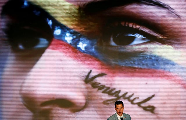 Venezuelan opposition leader Juan Guaido, who many nations have recognized as the country`s rightful interim ruler, attends a meeting with students in Caracas, Venezuela on 8 February 2019. Photo: Reuters
