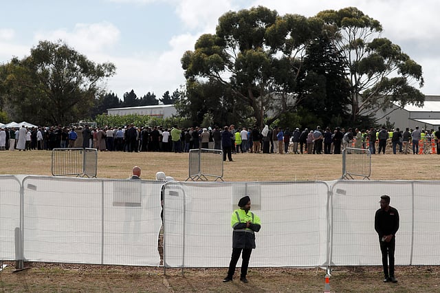 People attend the burial ceremony for the victims of the mosque attacks at the Memorial Park Cemetery in Christchurch, New Zealand on 20 March. Reuters File Photo