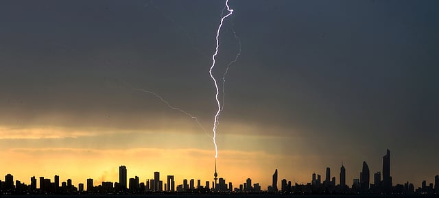 Lightning strikes the liberation tower in Kuwait City during a thunder storm on 5 April 2019. Photo: AFP